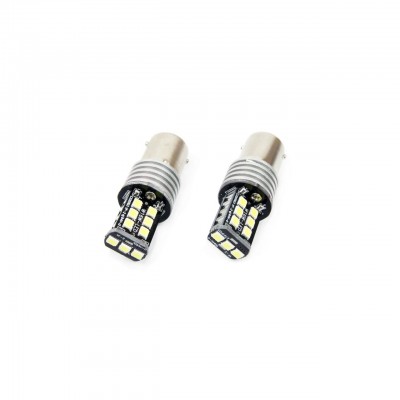 Set becuri auto cu LED CANBUS compatibil P21W BA15S 15 SMD 7.5W Alb 12/24V, destinat competitiilor auto sau off-road