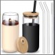 Set 2 Pahare din Sticla Termoizolante Transparente, Flippy, Capace si Paie Incluse, 500 mL, Silicon Negru si Crem